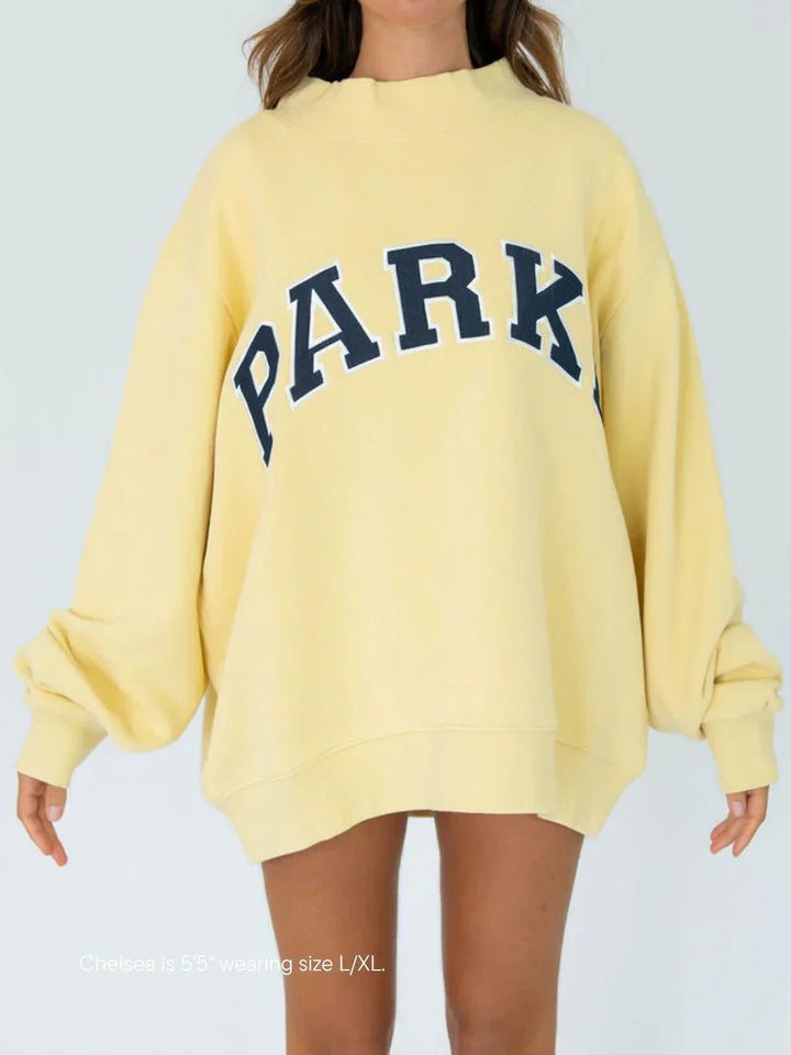 Varsity Mockneck Pastel Yellow with Navy Letters
