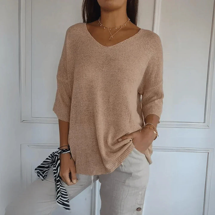 Women's V-Neckline Three-Quarter Sleeve Shirt with Dropped Shoulders and Knit Surface