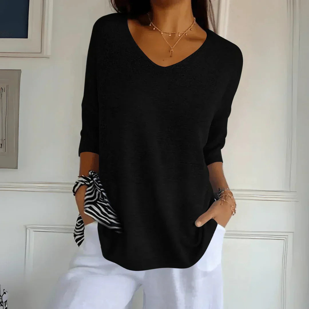 Women's V-Neckline Three-Quarter Sleeve Shirt with Dropped Shoulders and Knit Surface