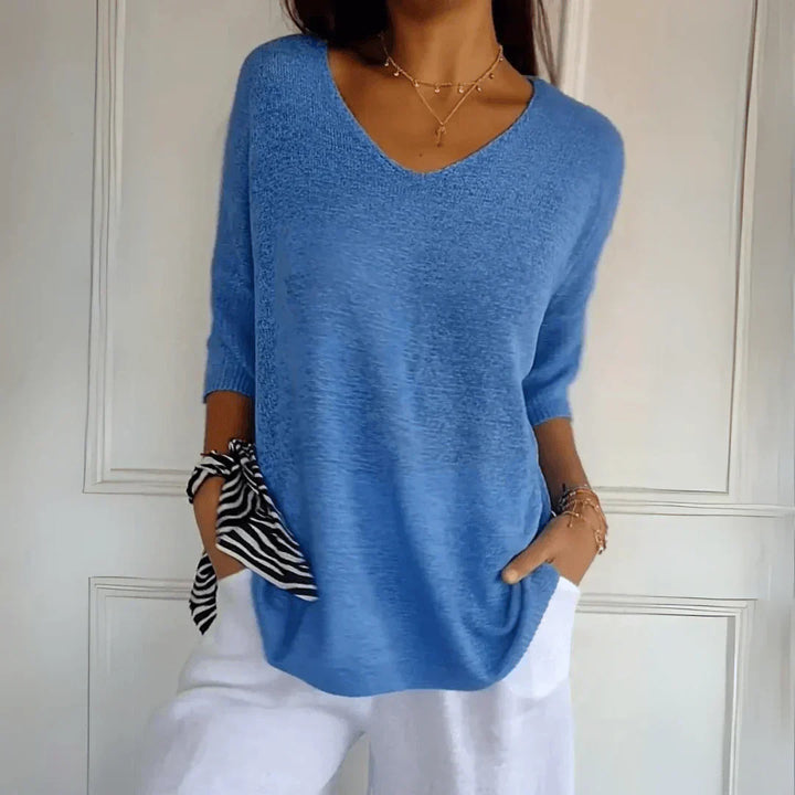 Women's V-Neckline Three-Quarter Sleeve Shirt with Dropped Shoulders and Knit Surface