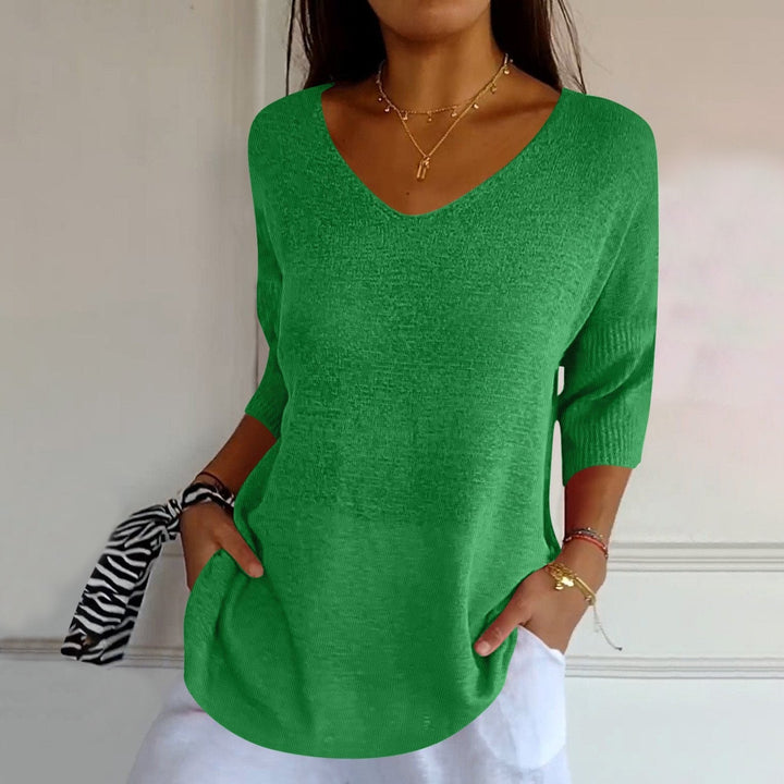 Women's V-Neckline Three-Quarter Sleeve Shirt with Dropped Shoulders and Knit Surface