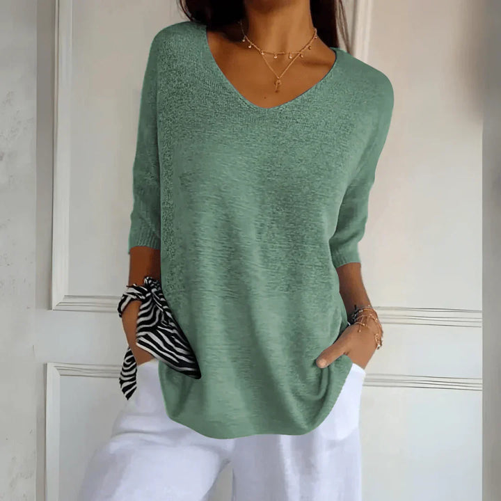 Women's V-Neckline Three-Quarter Sleeve Shirt with Dropped Shoulders and Knit Surface