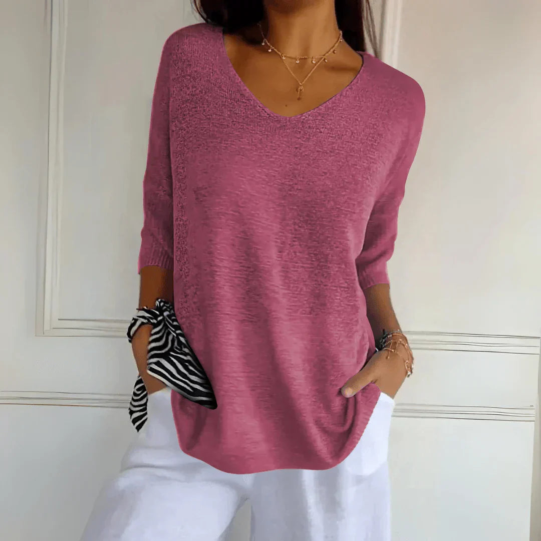 Women's V-Neckline Three-Quarter Sleeve Shirt with Dropped Shoulders and Knit Surface