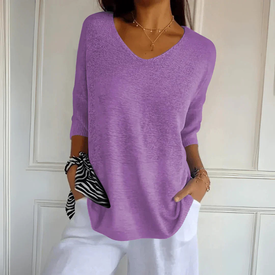Women's V-Neckline Three-Quarter Sleeve Shirt with Dropped Shoulders and Knit Surface