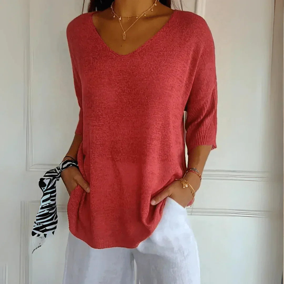 Women's V-Neckline Three-Quarter Sleeve Shirt with Dropped Shoulders and Knit Surface
