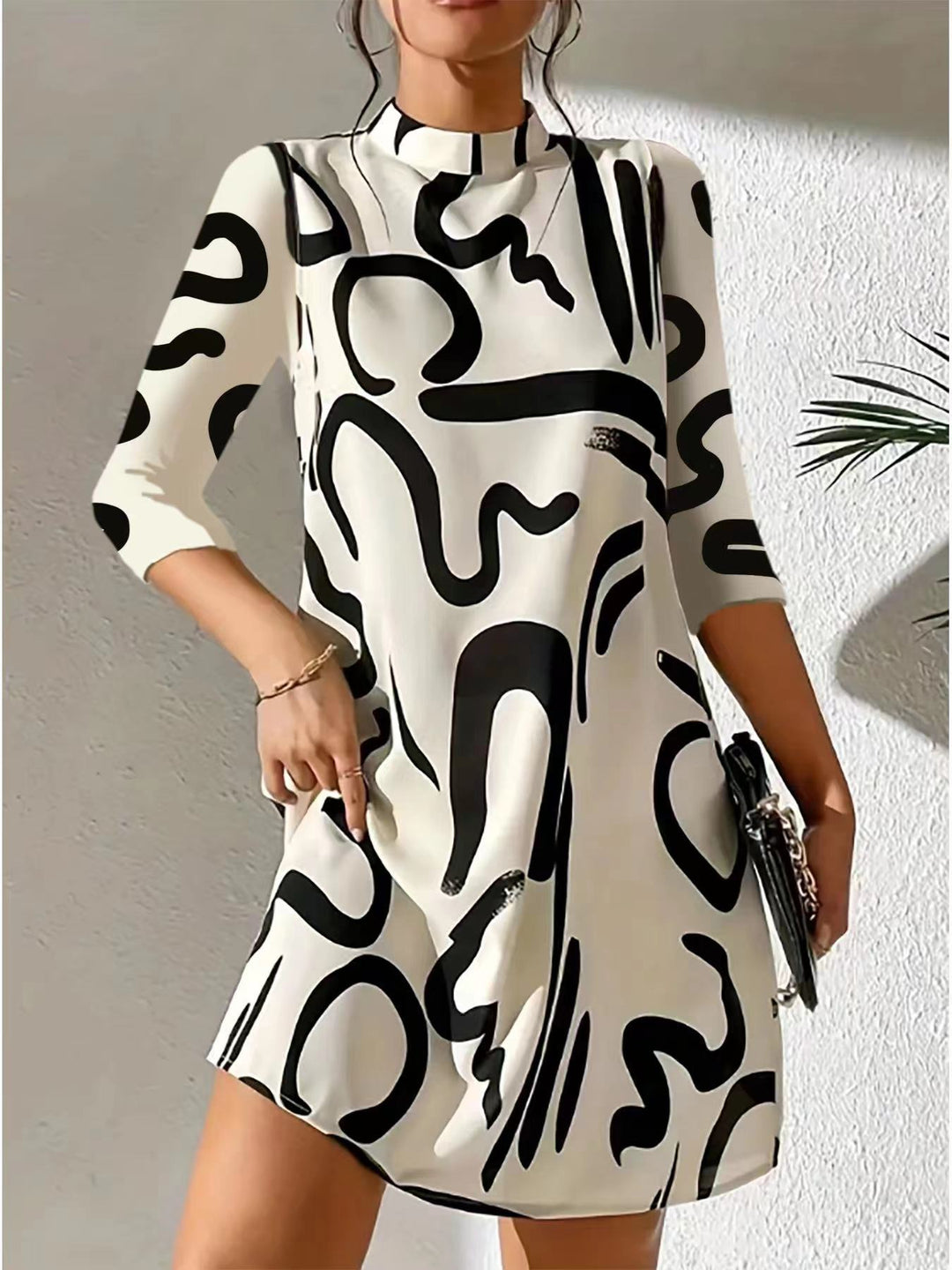 womens-mini-dress-in-knit-with-abstract-print-and-keyhole-back-3