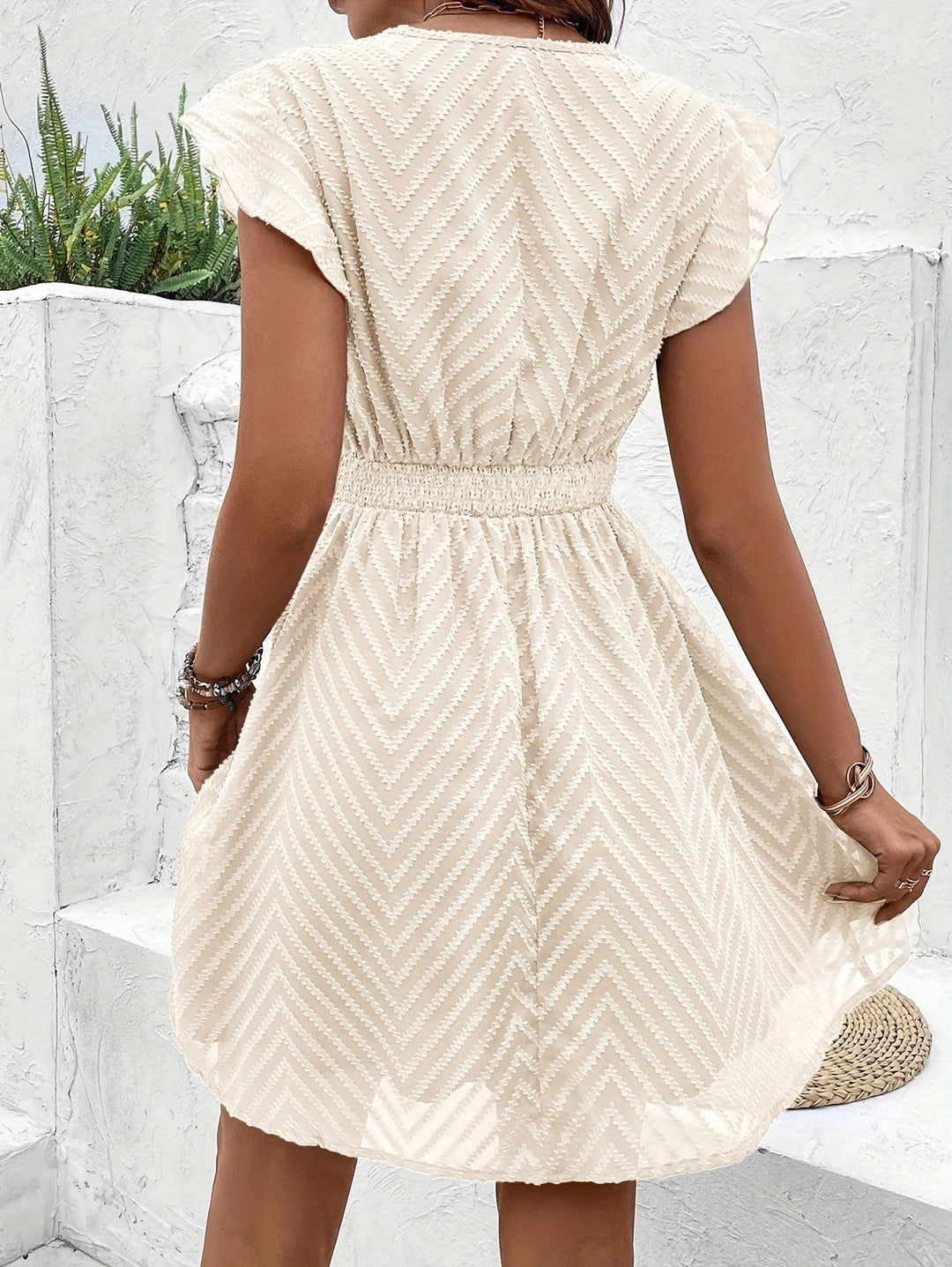 womens-mini-dress-in-woven-material-with-v-neck-trim-and-flutter-sleeves-4