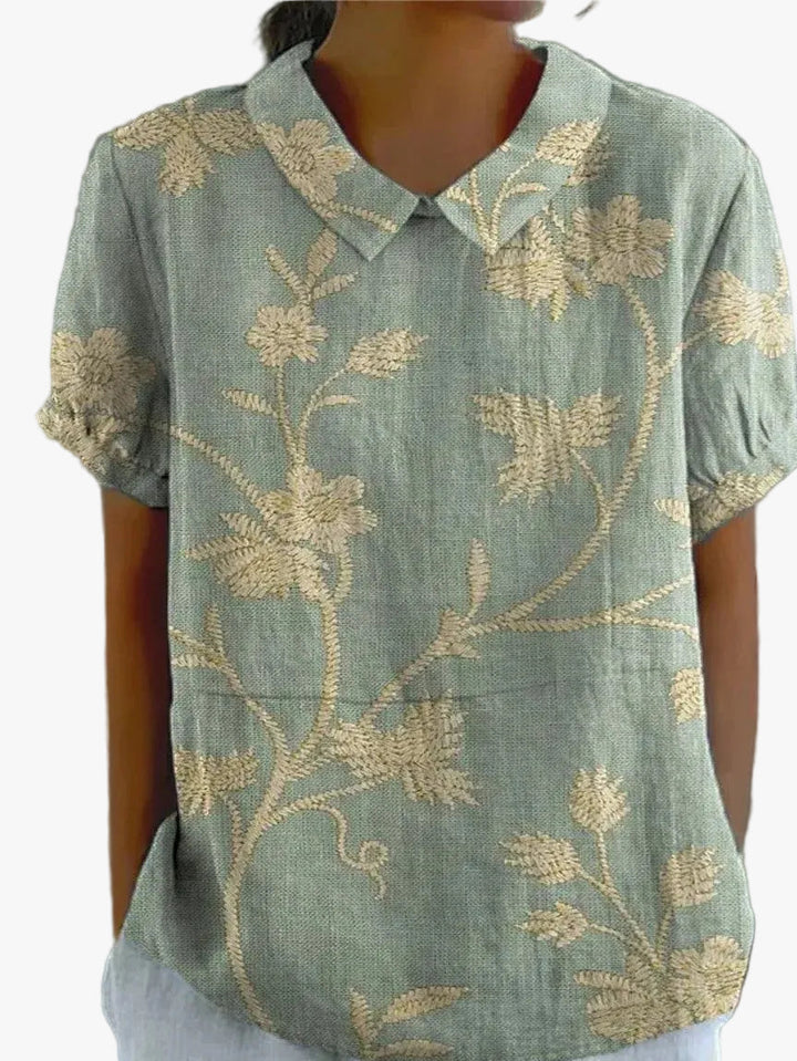 womens-woven-floral-blouse-with-v-notch-collar-and-short-sleeves-1